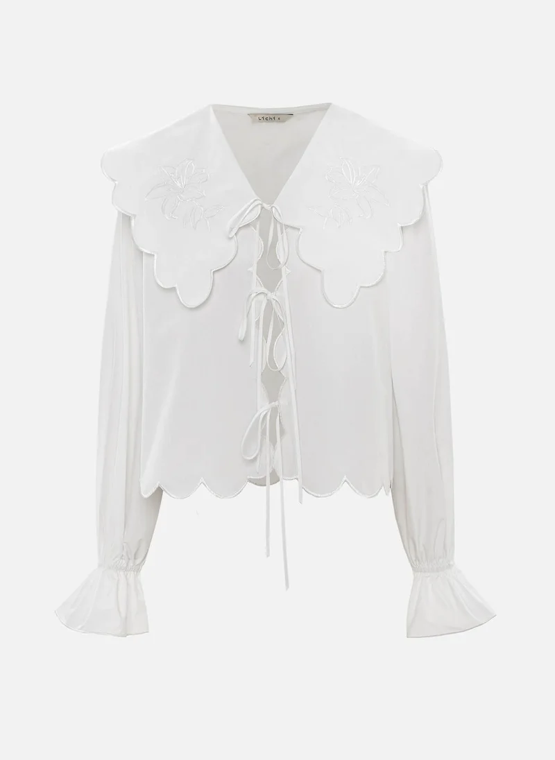 ليتشي بلوزة قصيرة بياقة مطوية وربطات